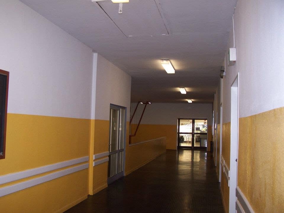 Upstairs faceing the Snackbar with your back to the bank.  (shared by Chris Brac